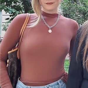 Skims milky sheer bodysuit